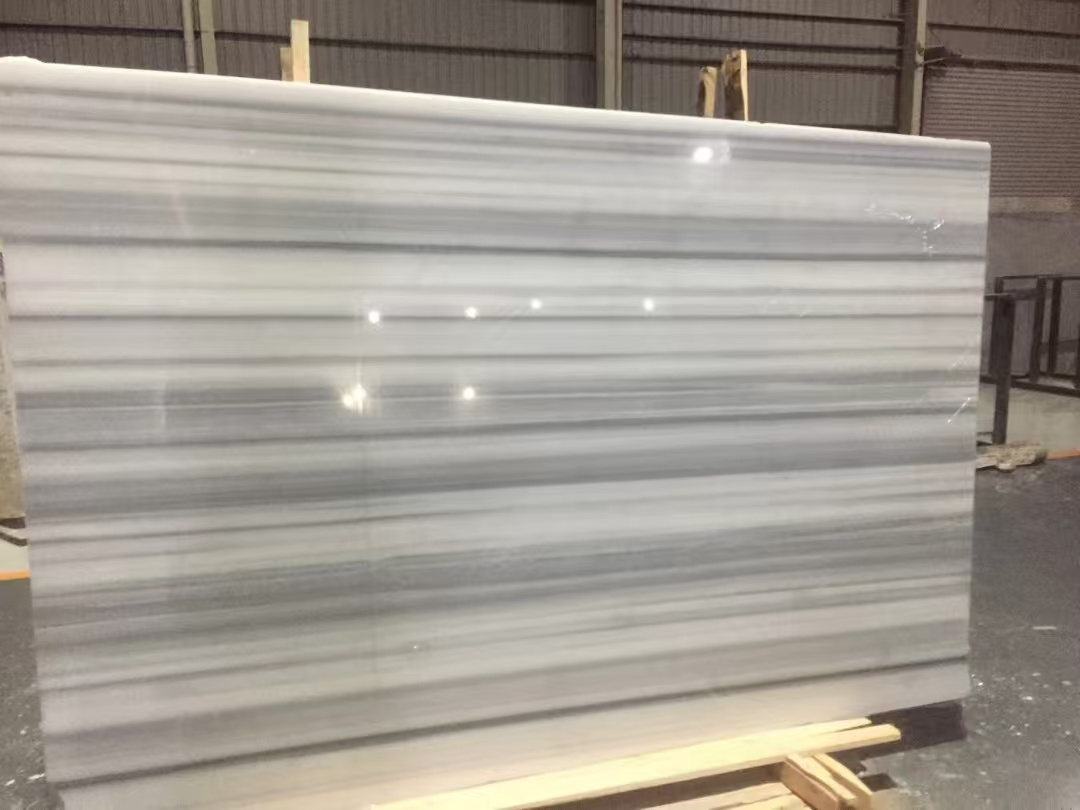 甘肃兰州宏泰石材批发生产加工：大理石、石英石、岗石、地铺料、干挂料、路沿石、挡车石球13919123140