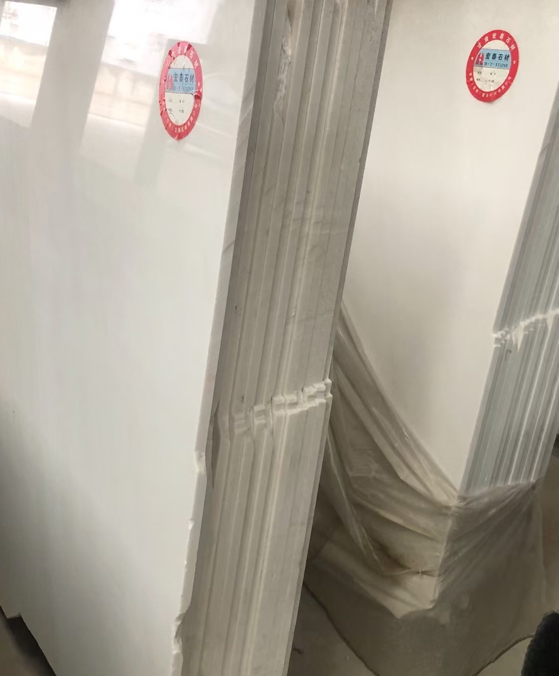 甘肃兰州宏泰石材批发生产加工：大理石、石英石、岗石、地铺料、干挂料、路沿石、挡车石球13919123140